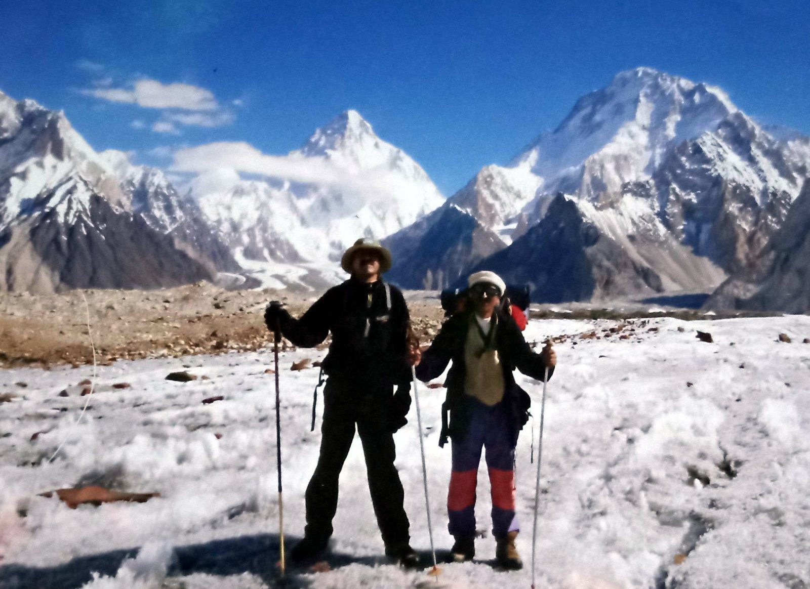 Rozi Ali guiding on the Baltoro Glacier near Concordia with K2 and Broad Peak behind