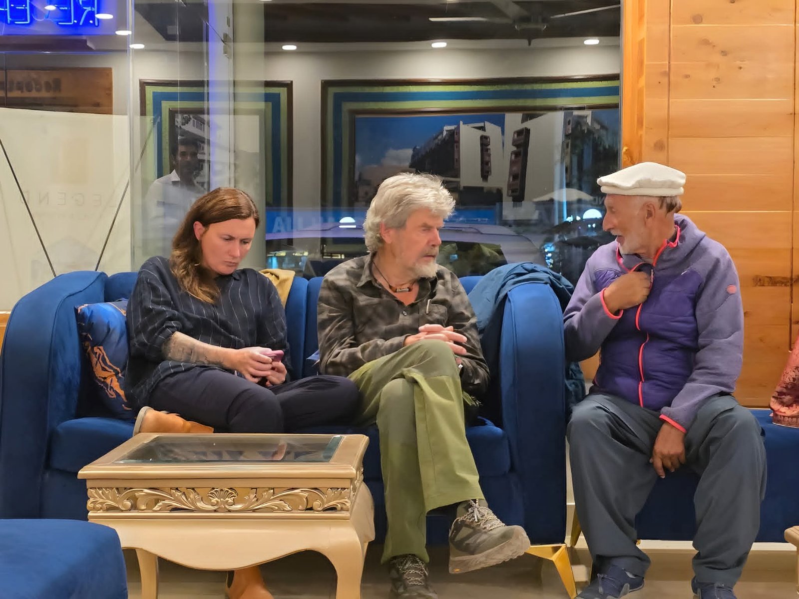 Rozi Ali with Reinhold Messner and his wife during their 2025 visit
